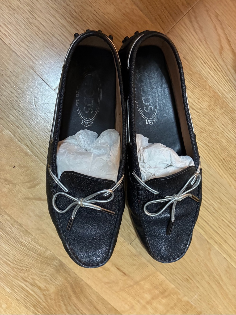 Tod's Black Leather Driving Loafers with Silver Bow Detail